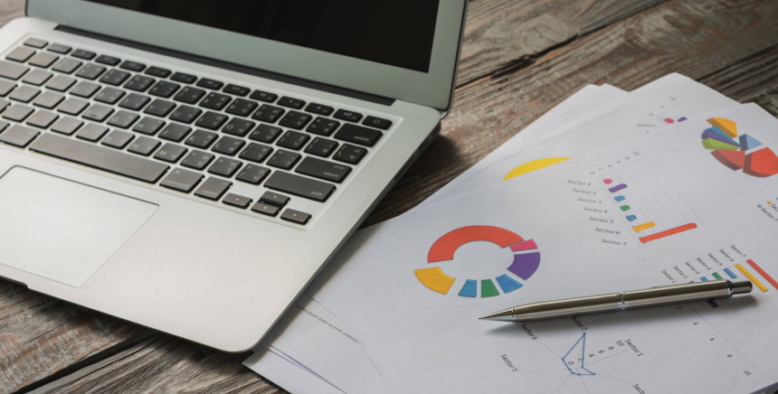 laptop-with-colorful-business-documents laptop-with-colorful-business-documents